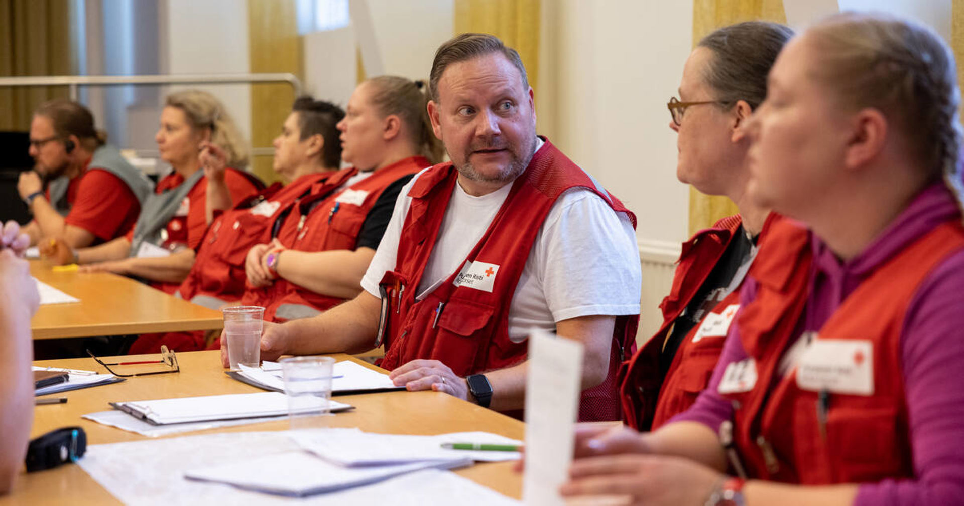 Volunteers around a table.