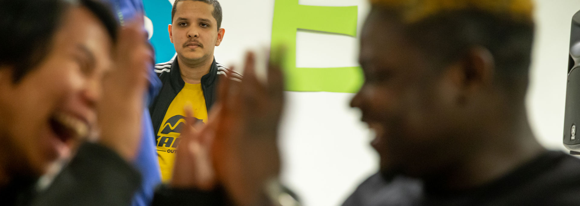 Two people giving each other a high-five.
