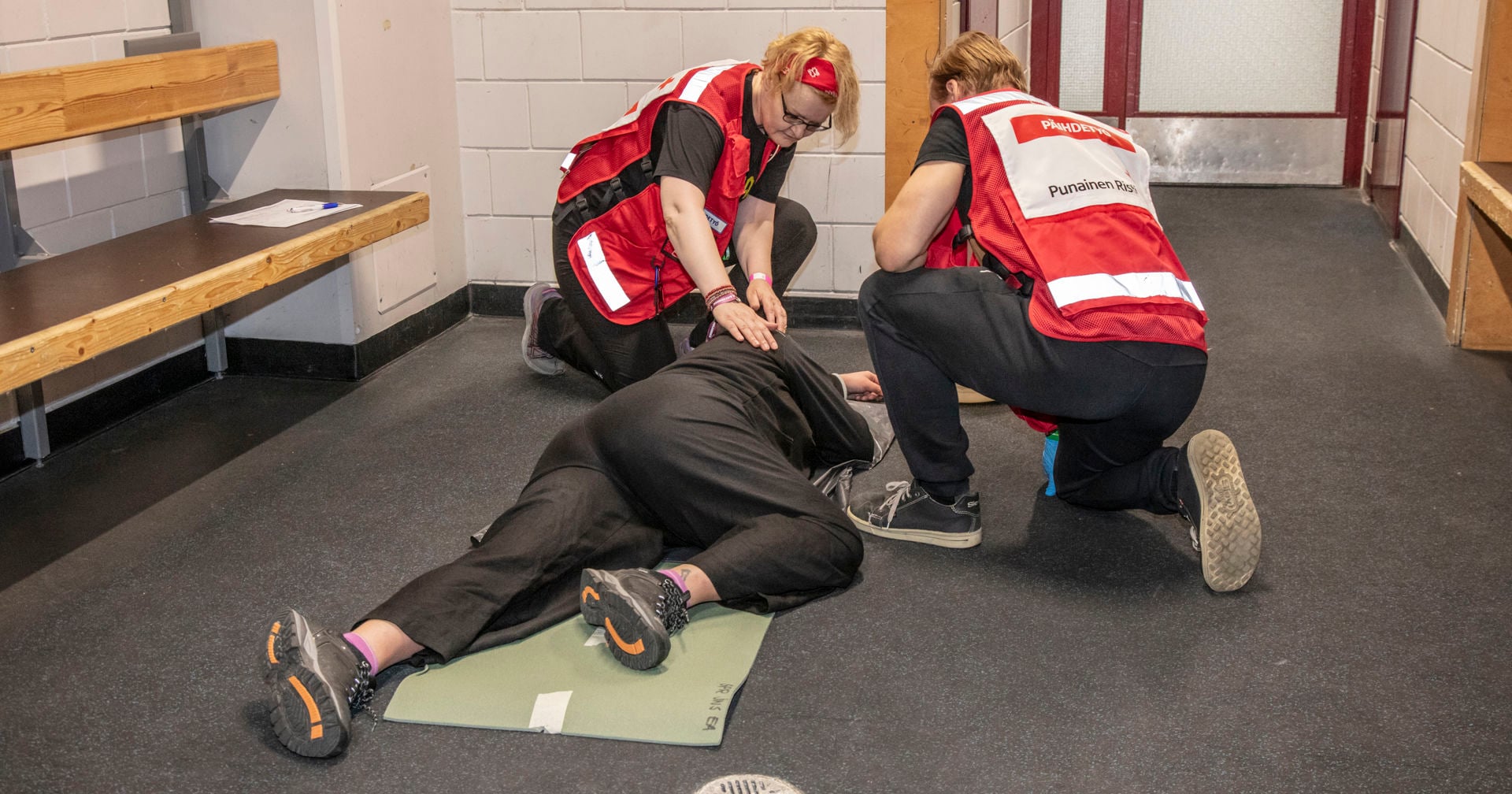 Volunteers at the Finnish Red Cross sobering-up station have helped a person into the recovery position.